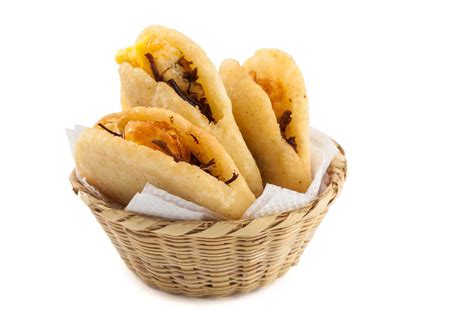  Arepas de Huevo: Uma explosão de sabores e texturas que se dissolvem em uma sinfonia tropical!